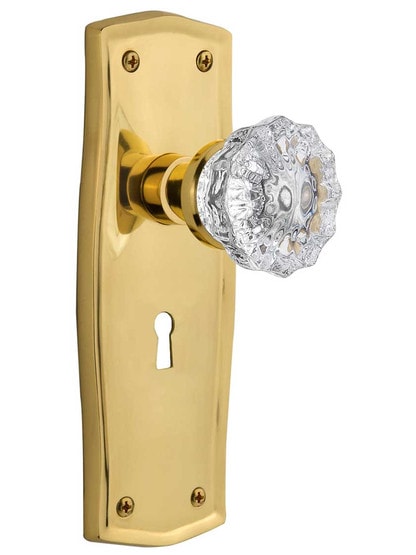 Prairie Design Mortise Lock Set With Fluted Crystal Door Knobs in Un-Lacquered Brass.